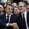 Britain 'to return just 50 migrants to France per week' under trial of 'one in one out deal' as Starmer tells Macron he is trying to make UK less appealing