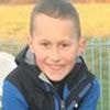 Family of 14-year-old who was killed in fire at derelict warehouse pay tribute to 'kind, caring and loving boy' as 14 children arrested in manslaughter probe are released on bail