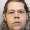 Killer wife who stabbed her husband in the neck before texting her mother 'I've done something awful' is jailed for life