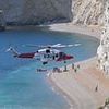 Woman in her 30s dies at Durdle Door beauty spot on hottest day of the year - as government scientists issues alert over 'killer' temperatures