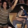 Dua Lipa cosies up to fiance Callum Turner as she parties the night away at Sunny Hill Festival to celebrate being granted her Kosovo citizenship