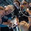 Gordon Ramsay and wife Tana embrace after gruelling charity triathlon challenge as son-in-law-to-be Adam Peaty is cheered on by fiance Holly and son George