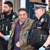 Nine arrested in dawn police raids after neo-Nazis 'hold birthday party for Adolf Hitler with swastika flags and birthday cake in pub'