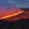 Tourists and residents evacuated as volcano erupts on Iceland, with magma bursting through half-mile-long fissure