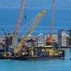 Experts seen starting £20million operation to raise the doomed Bayesian almost a year after superyacht tragedy