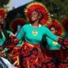 Notting Hill Carnival begins with burst of colour