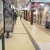 Boy, 15, and 42-year-old man are stabbed at busy bus station: Police arrest teenage girl but still hunting 'knifeman'