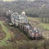 Owner of the 'biggest slum in Britain' finally reveals why abandoned £41m newbuild palace was left to rot in Sussex field