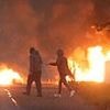 Police are working 'night and day' to catch Ballymena rioters after alleged sex attack on local girl sparks violent disorder