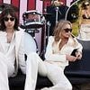 Kate's gone Glasto again! Moss launches Zara festival 2025 look... but won't those white suits struggle to cope with all that mud?
