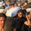 At least 30 killed by Israeli fire while waiting for aid, Gaza civil defence ministry says