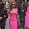 Elizabeth Hurley, 59, and Billy Ray Cyrus, 63, put on a loved up display as they make FIRST outing as a couple at swanky bash in Rome - after shocking the world with their unlikely romance
