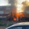 Moment flames ravage home in Bristol after huge 'gas explosion' - as three people are rushed to hospital and street evacuated