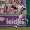 Happ homers, has 4 RBIs on 3 hits as Cubs down Nats 7-1