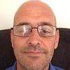 Husband is found not guilty of plotting to hire a hitman to kill his estranged wife- after jury heard co-accused spent the money on Benidorm holiday