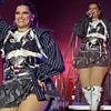 Nelly Furtado, 46, delights fans with Noughties nostalgia as she storms the stage in a racy cut out top and mini skirt at the Big Feastival