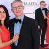 Martin Freeman, 53, puts on a loved-up display with French actress girlfriend Rachel Benaissa, 30, as she stuns in a red caped gown at BAFTA TV Awards 2025