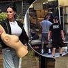 Katie Price throws herself into house move while unloading boxes into her new home - as she leaves 'cursed' Mucky Mansion in the past