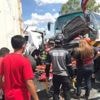 10 killed in Philippines after passenger bus slams into vehicles at a toll booth