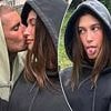 Justin Bieber kisses wife Hailey in Switzerland... after he sang about her 'throwing stones at my back'