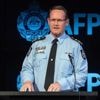 Woman becomes third person charged under Australia's foreign interference laws
