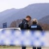 Australia police shooting suspect named as manhunt continues