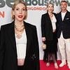 Pregnant Katherine Ryan flashes her baby bump in a cut out top and netted skirt as she leads the stars at The Real Housewives of London premiere