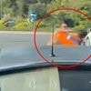 Moment road rage motorist throws punch at recovery truck driver in furious bust up at roundabout