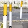 Graffiti artist who transformed bollards into giant cigarettes sparks row and leaves families fuming