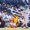 Shohei Ohtani high-fives a heckler after his homer to cap Dodgers' comeback rivalry win over Padres