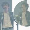 Matty Healy smokes a cigarette and drinks a pint of Guinness before calling himself his generation's 'best songwriter' as he takes to the stage for The 1975's Glastonbury headliner set
