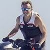 Le glow-up: Emmanuel Macron shows off Trump-style tan during White House summit after buff-looking French President was pictured jet-skiing on holiday