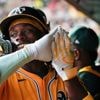 Athletics beat Reds 3-0 as Carlos Cortes hits 2 homers