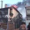 Firefighters battle to contain Greek wildfires