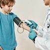 Children should have their blood pressure monitored from the age of 7 to prevent fatal midlife heart disease, experts say