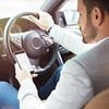 Nine in 10 drivers admit to being unable to complete a car journey without touching their phone