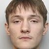 Moment balaclava-clad teen, 17, flees after stabbing man through the heart with a Rambo-style knife