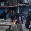 Riot police clash with students protesting lawmakers' allowances in Indonesia