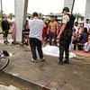 'British man is LYNCHED in Ecuador' by furious mob who dragged him out of police station and burned him alive after he was arrested over fatal shooting of a local man