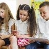 Primary school-aged children are physically struggling to sit on the carpet in class and even in chairs 'as a result of SCREEN time'