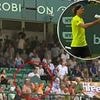Female fan, 62, taken to hospital after advertising panel collapsed on her during Alexander Zverev match - as German star comes to her aid