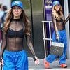 Myleene Klass shows off her toned figure in a mesh top and bold blue cargos as she arrives at Smooth Radio amid feud with Frankie Bridge and Rochelle Humes