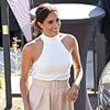 How Meghan Markle used clothes to send a subtle message: Duchess's Invictus Games wardrobe marked a turning point free from royal style constraints