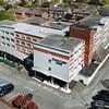 'We're worried...we've been kept in the dark': Inside leafy Cheshire town convulsed by fear after 300 male migrants arrived at hotel in dead of night