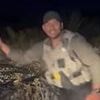 Sickening moment cop launches heinous attack on adorable animal... before vile threat to his colleague