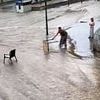 Roads turn into rivers as flood-hit Spain grapples with huge torrents of water and thunderstorms amid Europe's 42C 'heat dome'
