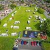 Travellers set up illegal encampment next to primary school as parents told to take 'extra precautions' when dropping their children off