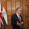 Scrambling ministers insist £5billion India trade deal will NOT 'undercut' British workers amid row over 'two-tier' tax exemption
