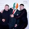 Irish rap trio Kneecap announce surprise performance in London hours after member is charged with terror offence 'for displaying flag in support of Hezbollah'