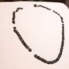 The Titanic gives up its forgotten treasures: Lost black glass necklace is recovered from the shipwreck after nearly a century underwater